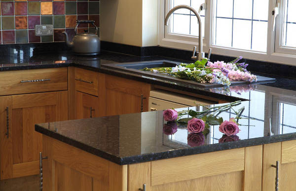 clean kitchen with roses on the countertops
