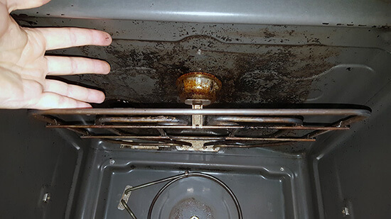 step 2- taking the grill away from the oven ceiling